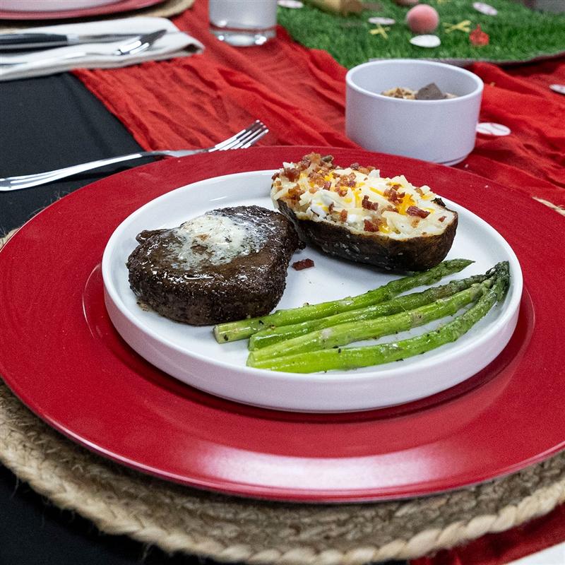  Missouri Senior Steak team plate up a coffee-crusted baseball-cut steak, loaded baked potato and asparagus for the recipe portion of the All-American Certified Angus Beef ® Cook-Off contest. 