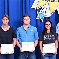 Group of Talon scholars holding awards certificates.