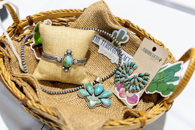 A basket of custom turquoise navajo-inspired silver jewelry was sold in the Angus Foundation Silent Auction at the 2025 NJAS event.
