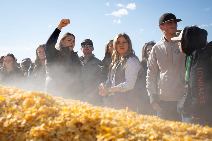 A group of NJAA members standing in front of a silage pit.