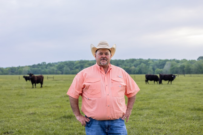 Jonathan Perry with cattle background