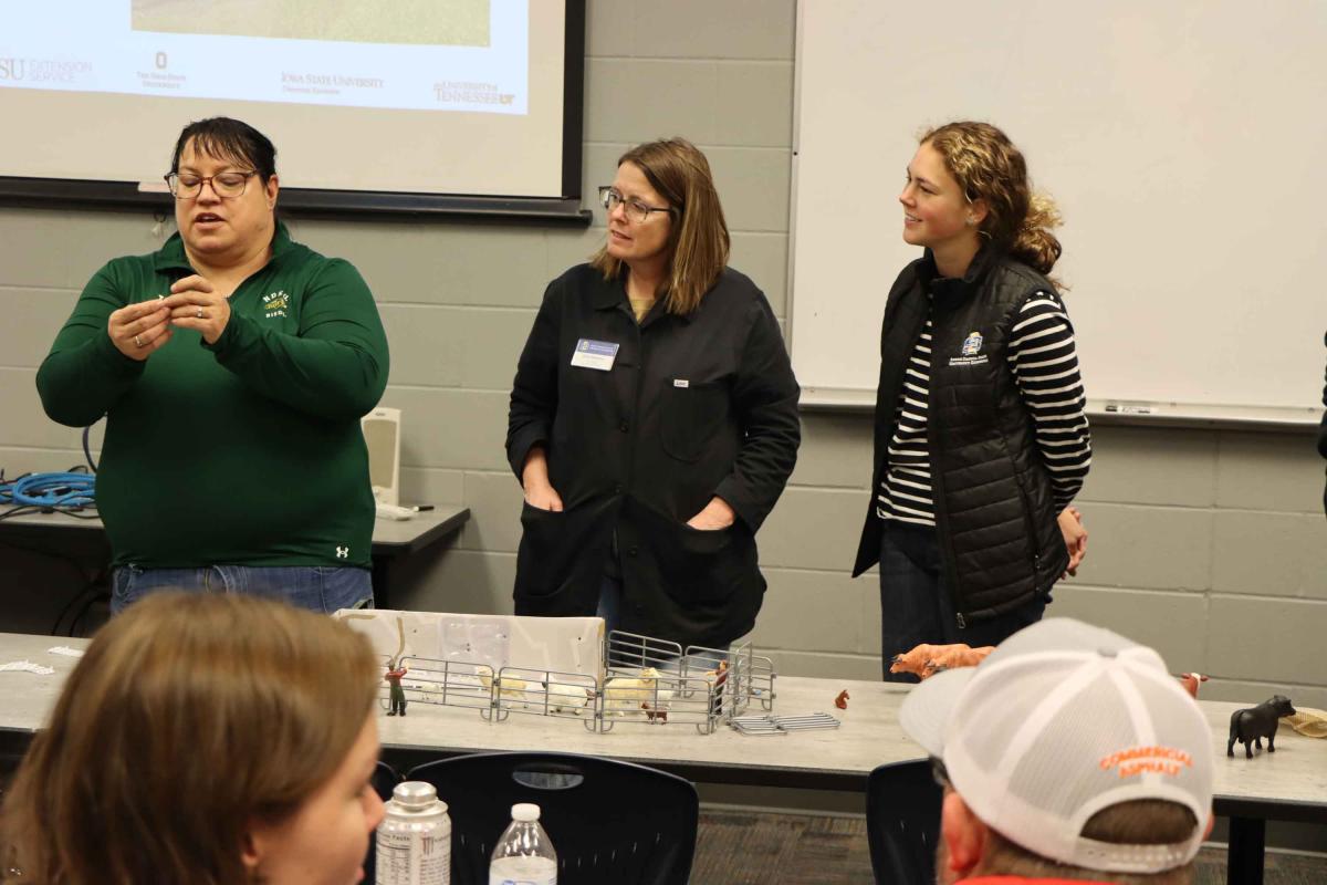 three ladies speaking