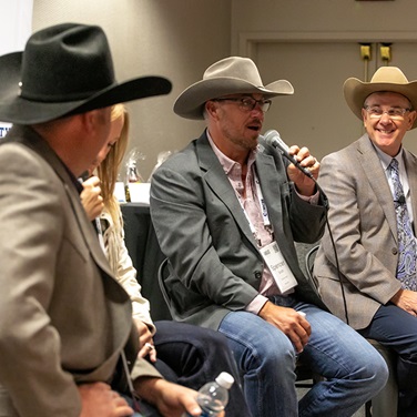 Brandon and Emily Richard, Spencer Smith, and Troy Marshall participated in a panel discussion during the Commercial Pathways Angus University session at the 2025 Angus Convention.