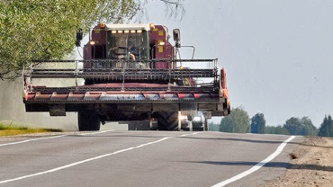 combine on road