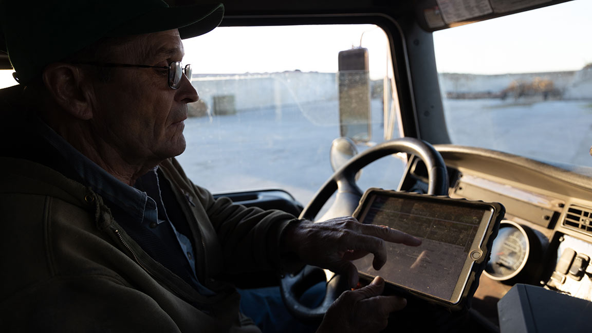 elderly man with computer