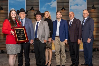 Express Ranches, Yukon, Okla., was named ROV Breeder of the Year at the 2025 Angus Convention Awards Dinner in Kansas City, Missouri. Pictured from left are Miss American Angus Rosalind Kidwell; Donnie Robertson, Kevin Hafner, Jennifer Callahan, Ryan Callahan, and Mark Squires of Express Ranches; and Mark McCully, American Angus Association CEO. 