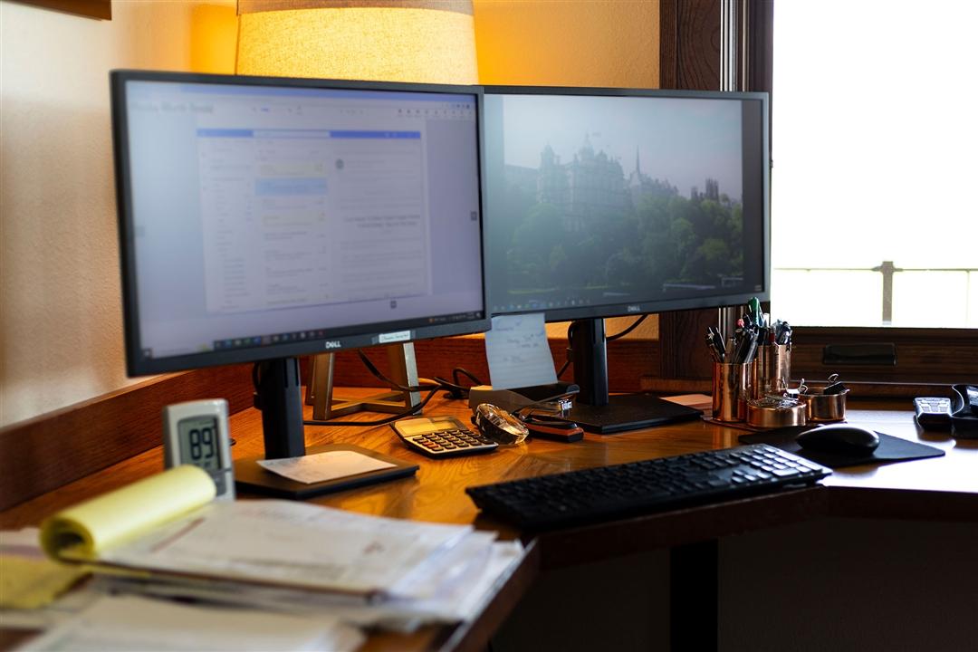 A member pulls up their Angus Online account on their office computer to conduct business with the American Angus Association.