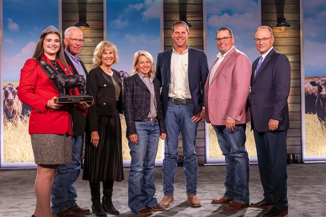Connealy Craftsman owned by Select Sires Inc., Plain City, Ohio, and Sexing Technologies, Navasota, Texas, sired 6,148 calves registered into the Angus herd book, the most of any in fiscal year 2025. Pictured from left are Rosalind Kidwell, Miss American Angus; Sharon and Jerry, Connealy of Connealy Angus Ranch; Lorna Marshall, Select Sires Inc.; Gabriel Connealy, Connealy Angus Ranch; Aaron Arnett, STgenetics; and Mark McCully, American Angus Association CEO.  