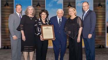 Dr. David Hawkins, Mason, Michigan, was inducted into the Angus Heritage Foundation at the 2025 Angus Convention on Nov. 1.    Pictured from left are Dan and Lisa Moser, son-in-law and daughter; Kathleen Hawkins, wife; Dr. David Hawkins; Jennifer Hawkins, daughter; and Mark McCully, American Angus Association CEO.  