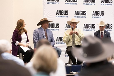 Oklahoma cattleman Jimmy Taylor talks about balancing maternal and terminal traits in his herd using genomic tools and other management strategies. Pictured from left to right are Esther Tarpoff of the American Angus Association®, Colorado cattleman Ryan Noble, Taylor, and Radale Tiner of the Association.