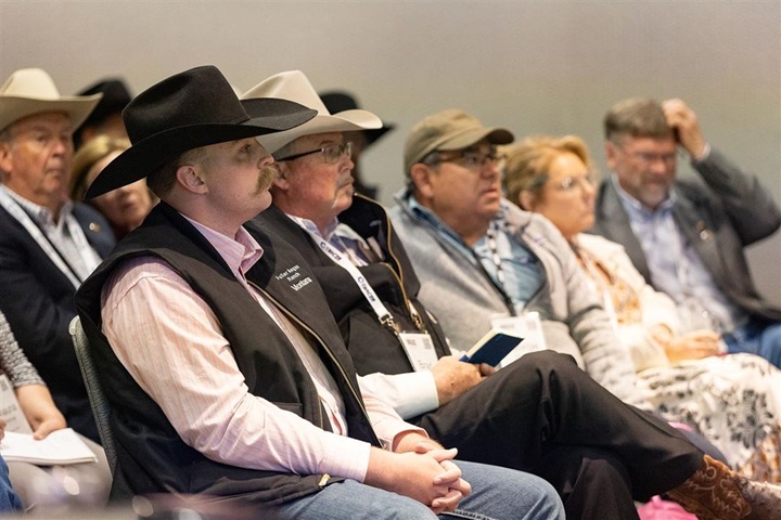 A large group of Angus University attendees listening to a presentation.
