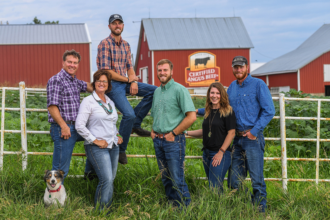Blythe Family Farms was recognized with the 2022 CAB Progressive Partner Award. From left are Duane, Debbie, Tyler, Eric, Brier and Trenton Blythe. 