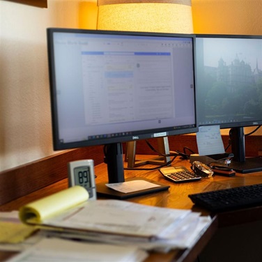 A member pulls up their Angus Online account on their office computer to conduct business with the American Angus Association.