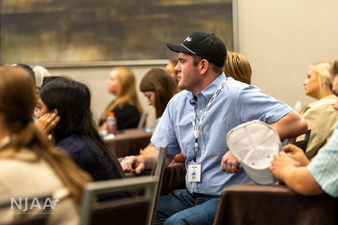 NJAA participant listening during a leadership presentation.