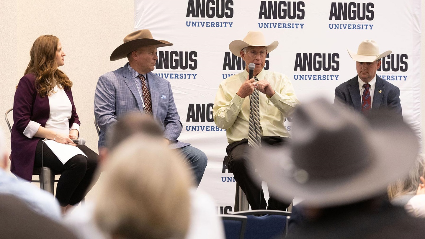 Oklahoma cattleman Jimmy Taylor talks about balancing maternal and terminal traits in his herd using genomic tools and other management strategies. Pictured (from left) are Esther Tarpoff, American Angus Association director of performance programs; Ryan Noble, Colorado cattleman; Taylor; and Radale Tiner, Association regional manager.