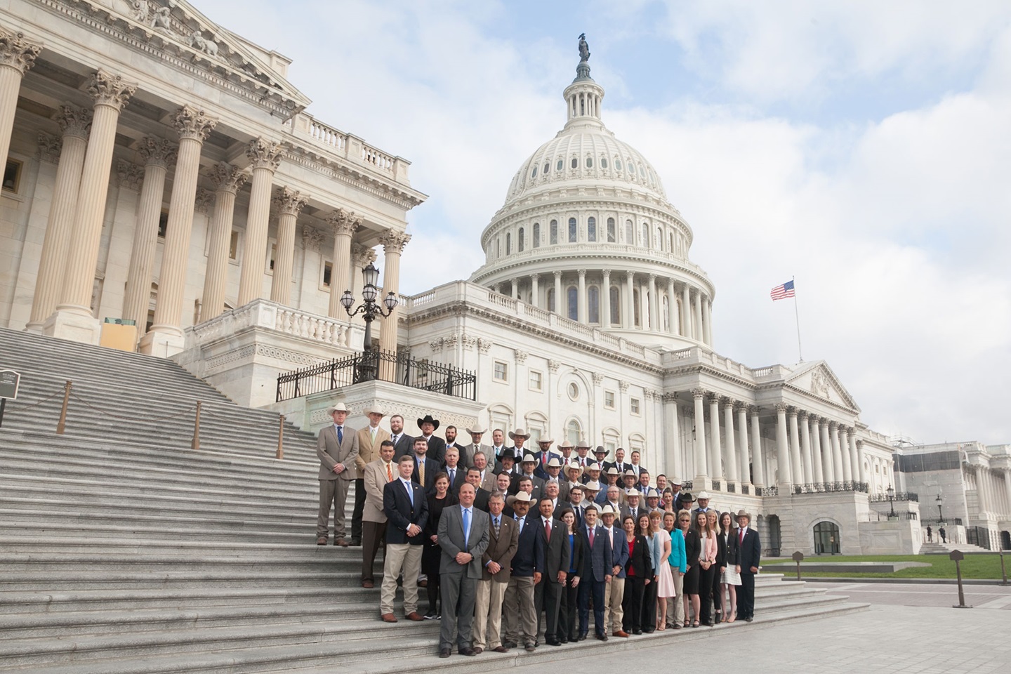 A group of YCC attendees standing on the steps of the capital in Washington, D.C.