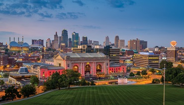 Union Station and the Kansas City skyline at dusk.