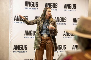A presenter from Certified Angus Beef leads an Angus University session at the 2025 American Angus Association annual convention.