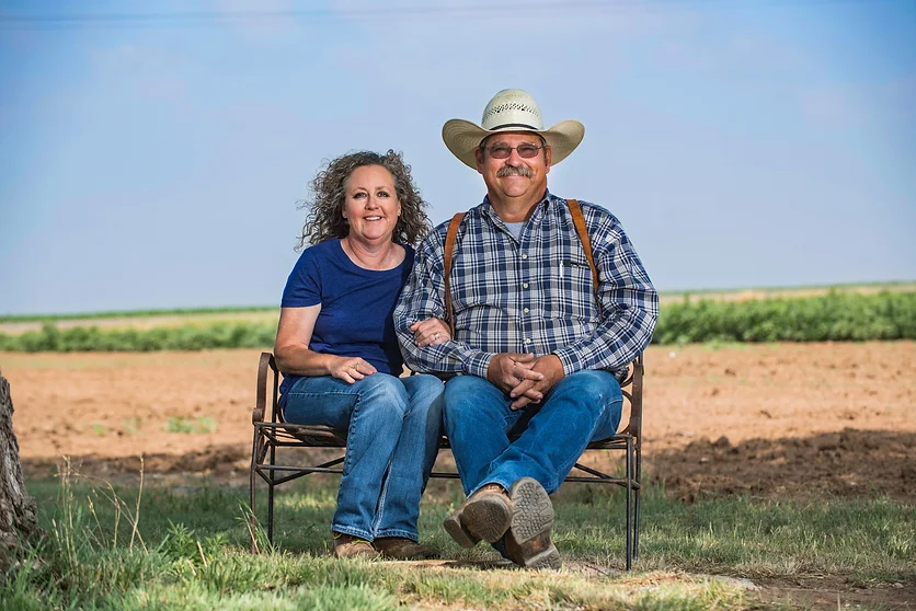 couple sitting on bench