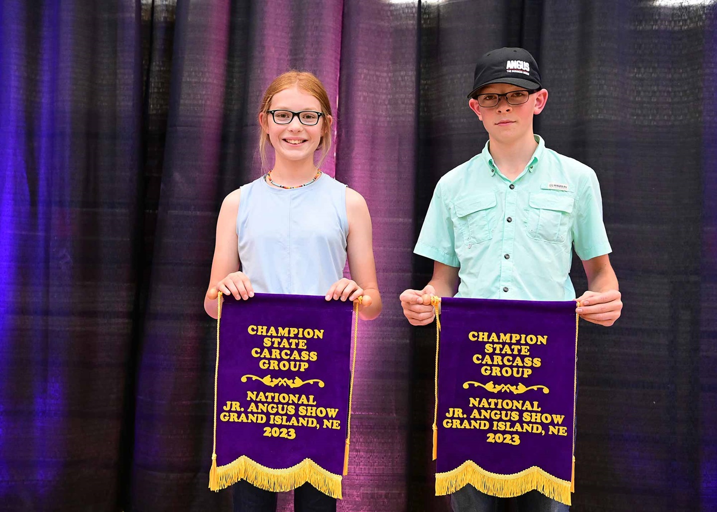  The team Kansas 3, including Corbin Russell and Kirwin Russell, took home the champion state group at the 2023 National Junior Angus Show in Grand Island, Neb. Pictured from left are Kirwin Russell, Paxino, Kan. and Corbin Russell, Paxino, Kan.