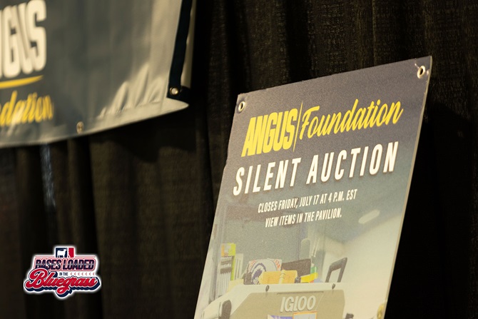 Sign promoting the Angus Foundation silent auction displayed at the National Junior Angus Show.