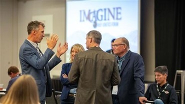 Attendees at the 2024 Imagine Conference connecting with one another and sharing ideas in Kansas City, Missouri.
