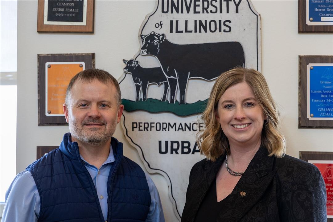 Dan Shike (left), professor and interim animal science department head at the University of Illinois Urbana–Champaign, and Kelli Retallick-Riley, president of AGI, pose as partnership representatives at the beef unit near the UIUC campus in March 2026. 
