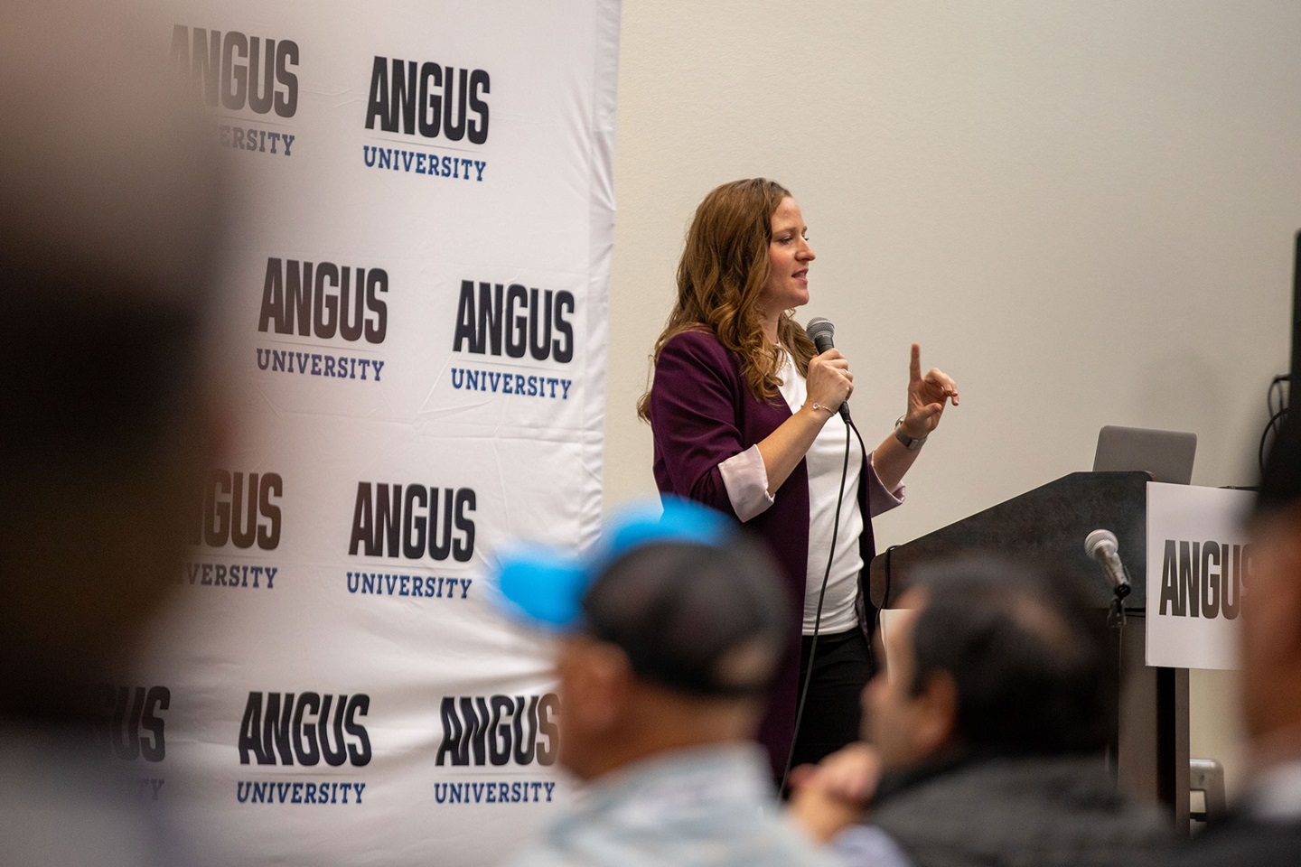 Esther Tarpoff, director of performance programs for the American Angus Association, presents to Angus breeders about tools for their commercial customers during Angus Convention in November in Fort Worth, Texas.