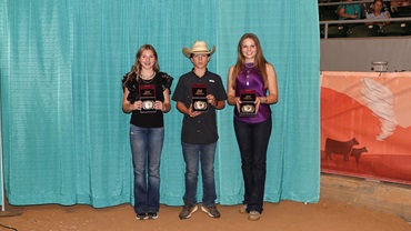 From left, Avery Mullen of Kansas, Lane Toledo of California, and Lauren Wolter of Illinois, were named winners of the Stockman Contest for their respective age divisions at the 2025 National Junior Angus Show in Tulsa, Oklahoma.