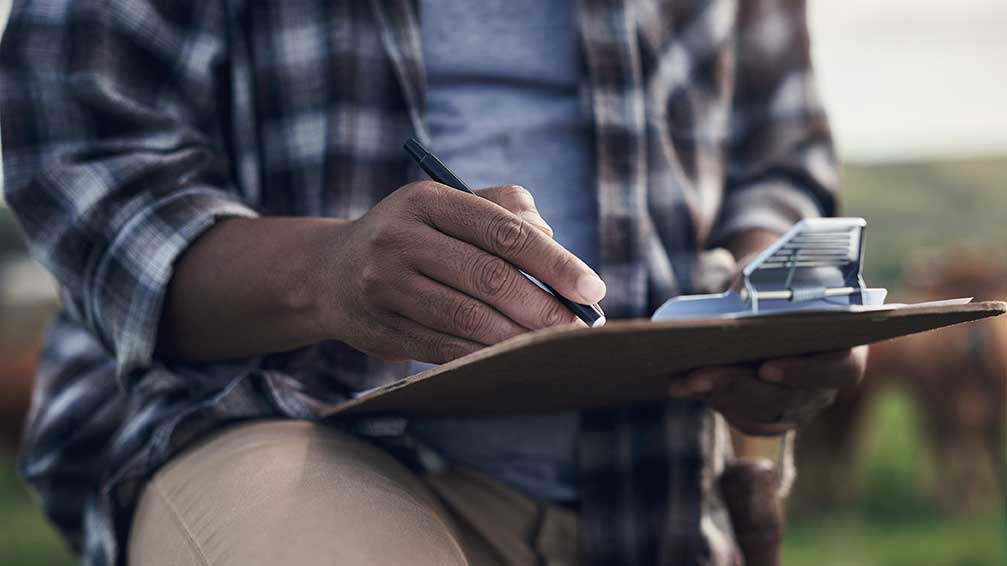 man with clip board