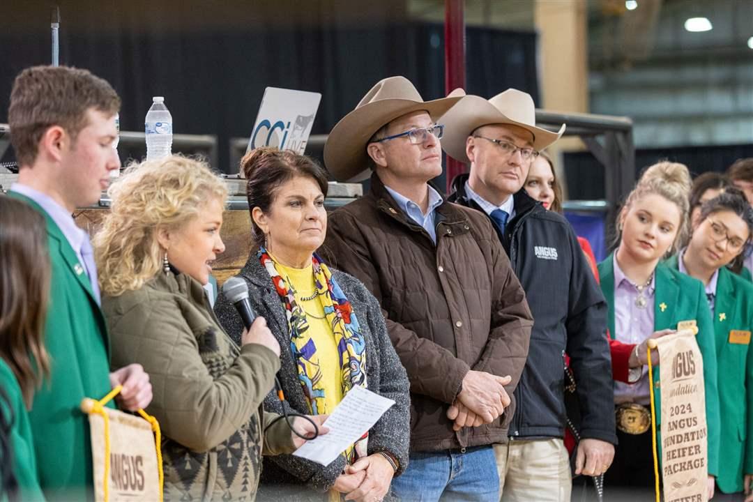 Jaclyn Boester, Angus Foundation executive director, introduces the 2024 Angus Foundation Heifer Package donor, Yon Family Farms of Ridge Spring, S.C., at the 2024 National Angus Bull Sale in Oklahoma City. The month of January brings many ways to support the Angus Foundation, including the 2025 heifer package donated by Pollard Farms of Waukomis, Oklahoma.