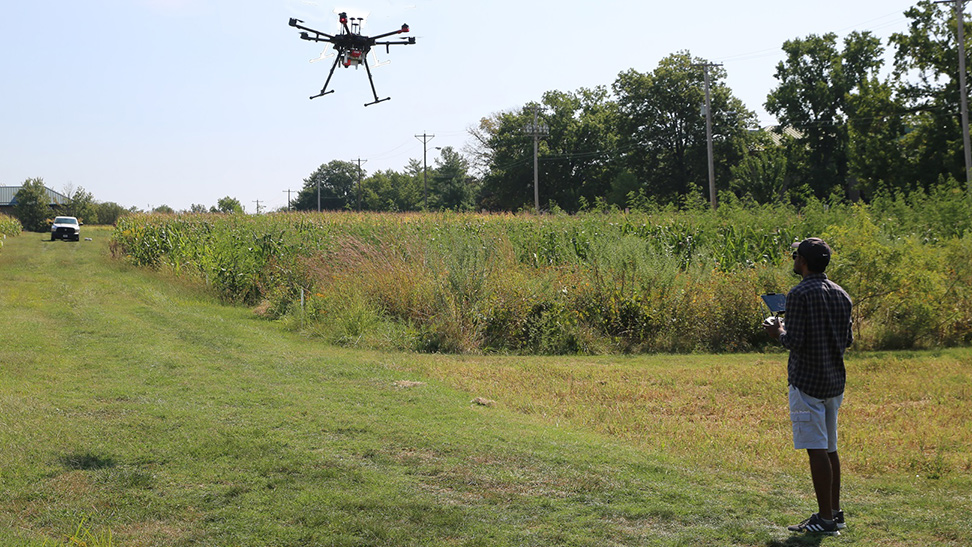 man flying drone