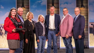 Connealy Craftsman owned by Select Sires Inc., Plain City, Ohio, and Sexing Technologies, Navasota, Texas, sired 6,148 calves registered into the Angus herd book, the most of any in fiscal year 2025. Pictured from left are Rosalind Kidwell, Miss American Angus; Sharon and Jerry, Connealy of Connealy Angus Ranch; Lorna Marshall, Select Sires Inc.; Gabriel Connealy, Connealy Angus Ranch; Aaron Arnett, STgenetics; and Mark McCully, American Angus Association CEO.  