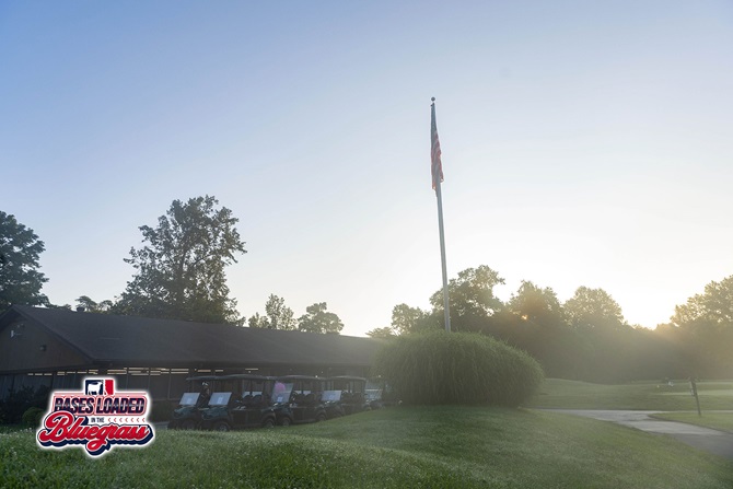The morning sun rises over the course and clubhouse as participants prepare for a day of golf during the Bases Loaded in the Bluegrass tournament.