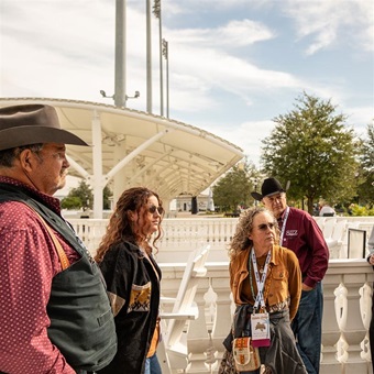 A group of Angus Convention attendees on an industry tour at a location in Florida.