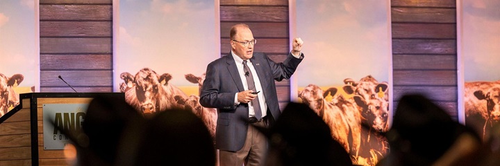 American Angus Association CEO, Mark McCully, presents to the general session attendees at Angus Convention.