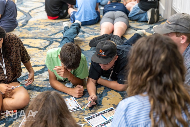 Small group collaborating on a team-building exercise.