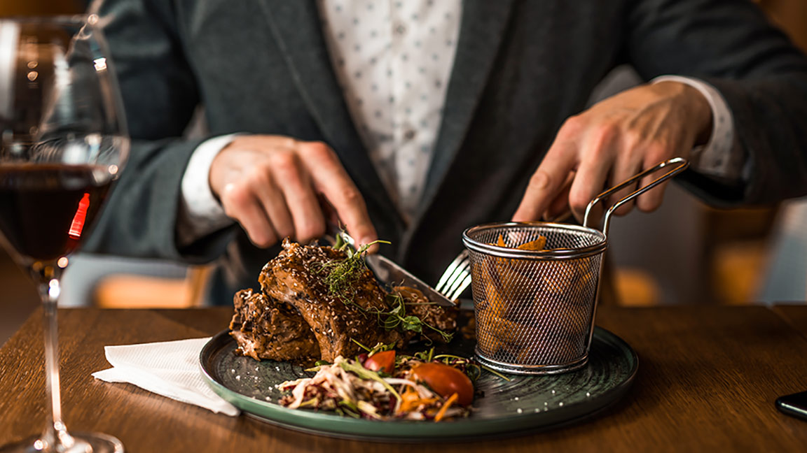 man eating stake 