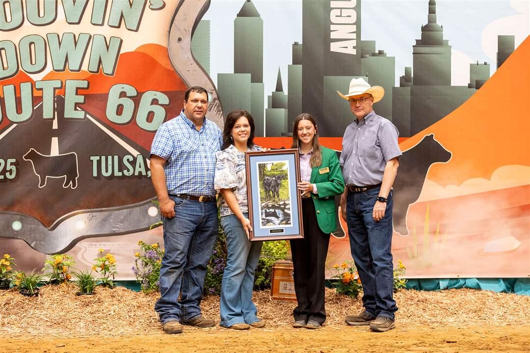 Kurt and Angie LeBeouf of Louisiana were recognized as the Advisor of the Year at the 2025 National Junior Angus Show in Tulsa, Oklahoma. Pictured from left are Kurt and Angie LeBeouf, Advisor of the Year; Allie Perry, NJAA Foundation Director; and Mark McCully, AAA Chief Executive Officer.  