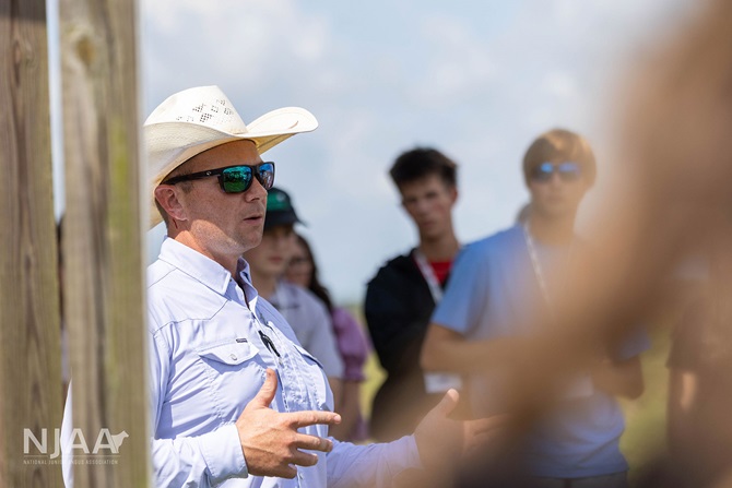 Ranch manager speaking to participants during a pasture tour.