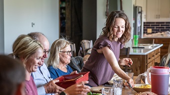 people at a table eating