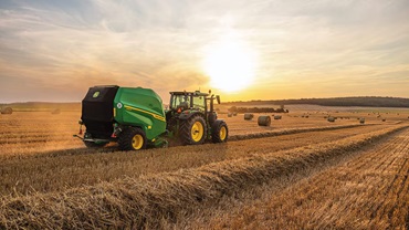 John Deere tractor and hay baler 
