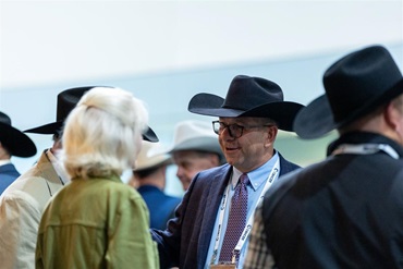 A group of individuals enjoy the candidate welcome reception at Angus Convention.