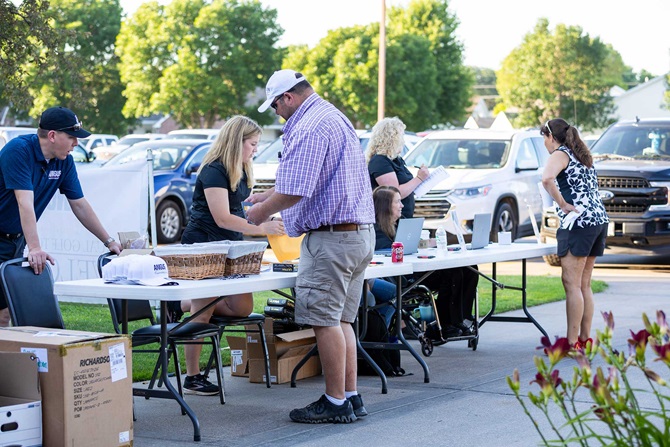 Registration table at a golf tournament event.