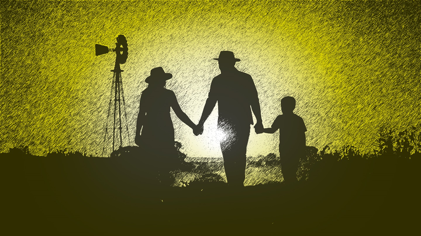 Family walking into ag sunset