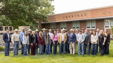 The 2025 Beef Leaders Institute Class gathers outside of the American Angus Association’s headquarters in St. Joseph, Missouri, during one of their educational stops. 