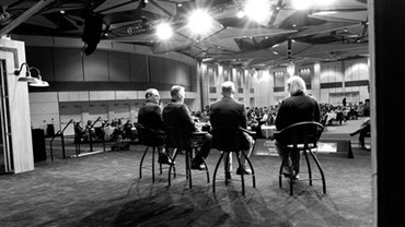 Speakers on stage at a candidate forum at the 2024 Angus Convention.