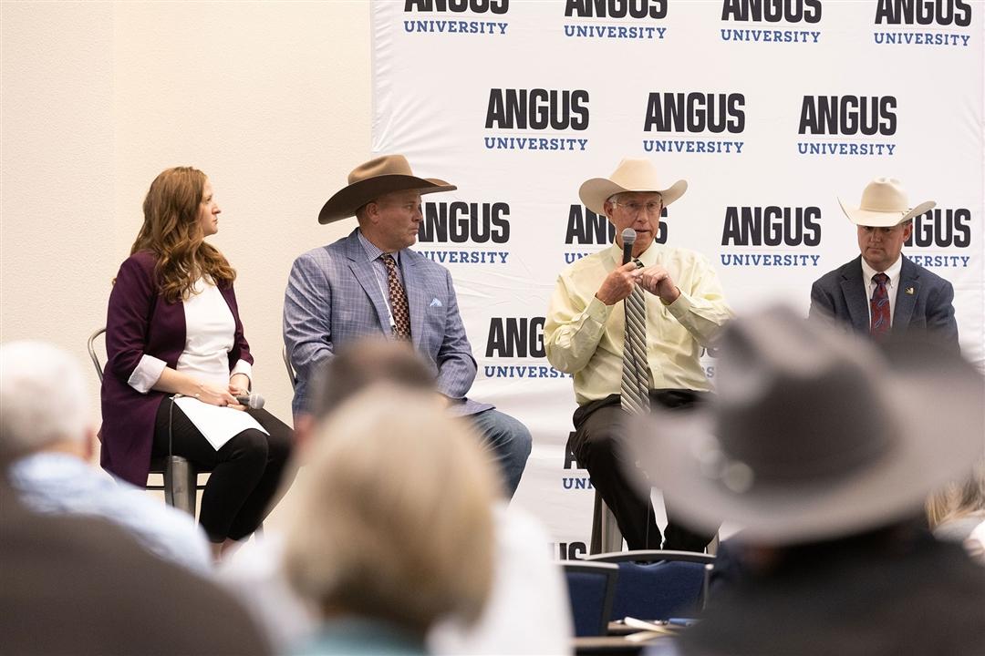Oklahoma cattleman Jimmy Taylor talks about balancing maternal and terminal traits in his herd using genomic tools and other management strategies. Pictured from left to right are Esther Tarpoff of the American Angus Association®, Colorado cattleman Ryan Noble, Taylor, and Radale Tiner of the Association.