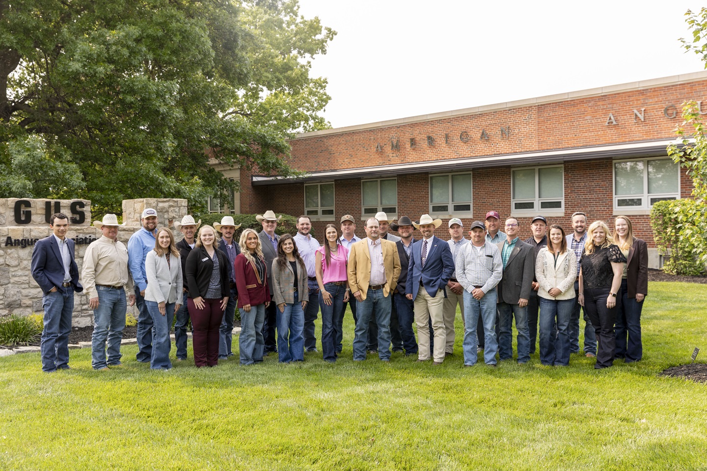 The 2025 Beef Leaders Institute Class gathers outside of the American Angus Association’s headquarters in St. Joseph, Missouri, during one of their educational stops.