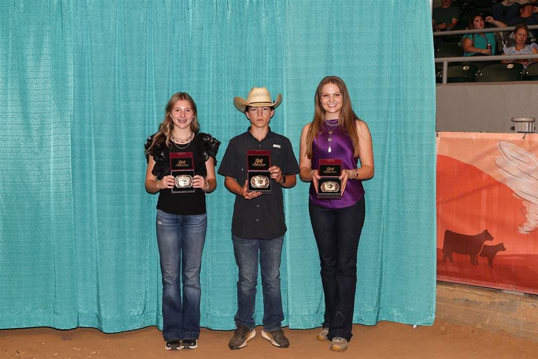 From left, Avery Mullen of Kansas, Lane Toledo of California, and Lauren Wolter of Illinois, were named winners of the Stockman Contest for their respective age divisions at the 2025 National Junior Angus Show in Tulsa, Oklahoma.